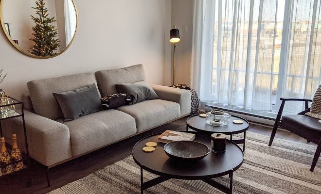 Studio arthur casas blends blue accents with neutral tones for apartment in libson