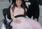 Some parents tried to keep a girl in a wheelchair out of prom. What happened when she finally showed up was pure karma.